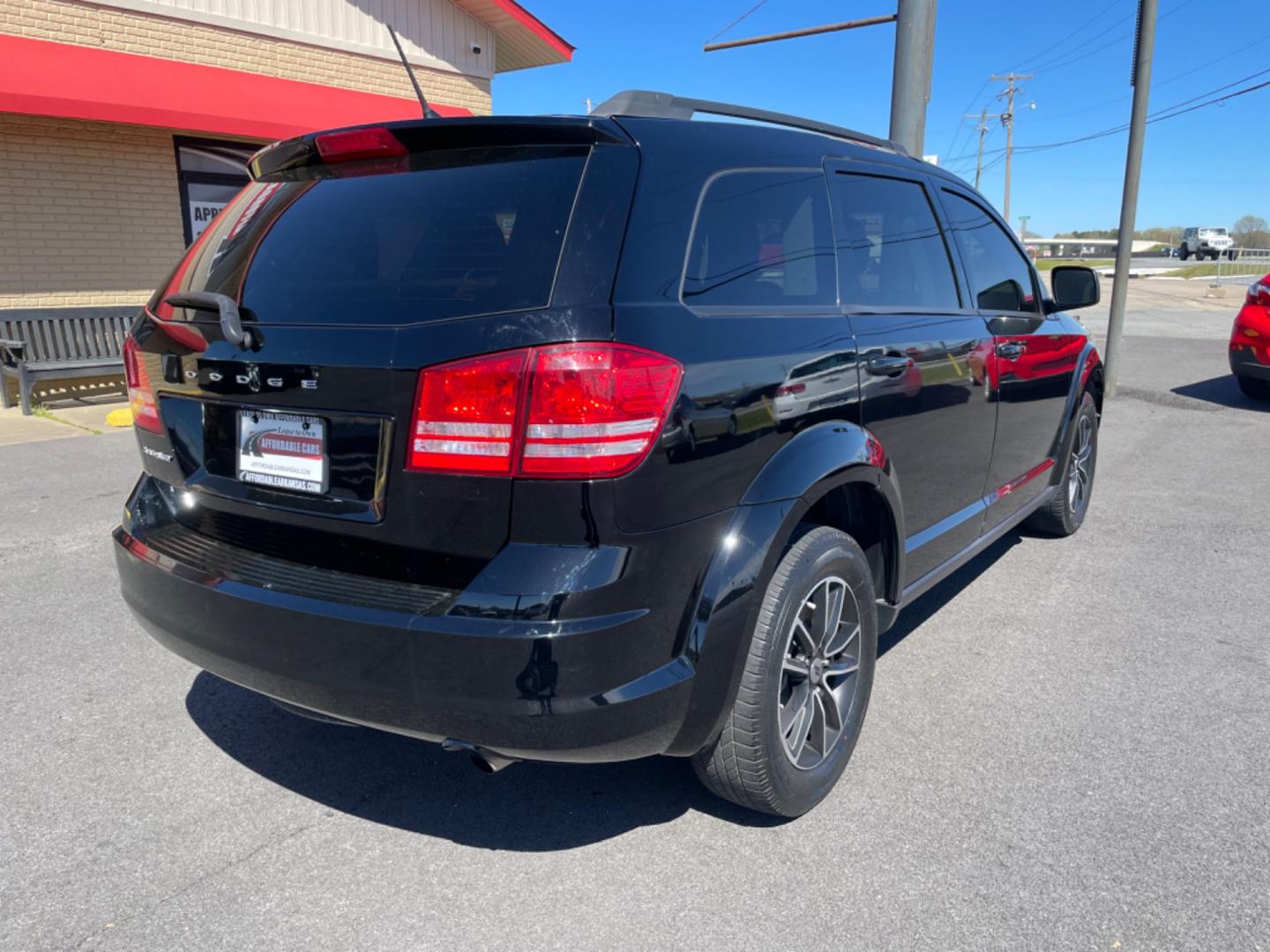 2018 Black Dodge Journey (3C4PDCAB5JT) with an 4-Cyl, 2.4 Liter engine, Automatic, 4-Spd w/AutoStick transmission, located at 8008 Warden Rd, Sherwood, AR, 72120, (501) 801-6100, 34.830078, -92.186684 - Photo#7